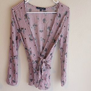 Women’s  floral wrap & tie blouse.